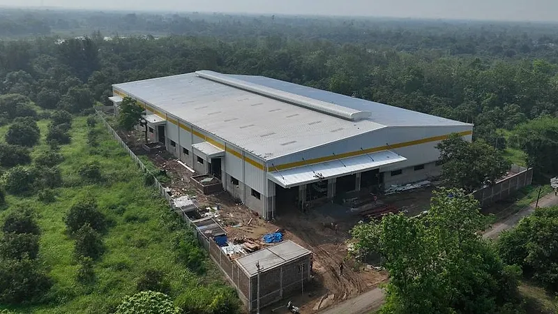Aerial view of the J K Industries manufacturing facility surrounded by trees