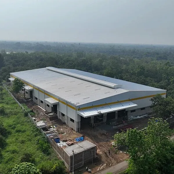 Aerial view of the J K Industries manufacturing facility surrounded by trees